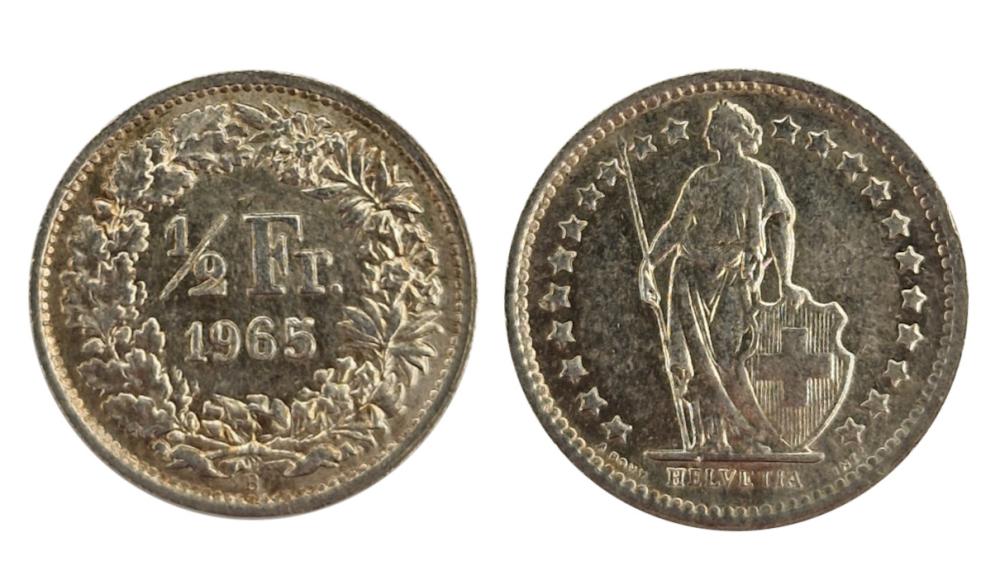 Il fronte e il retro della moneta d'argento da 1/2 franco coniata tra il 1875 e il 1967 © PeMeSec GmbH
